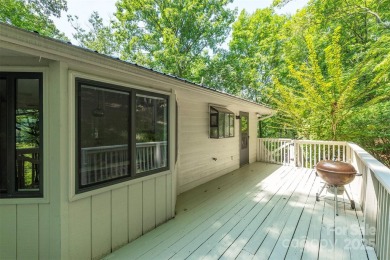 Tucked away in the sought-after Rumbling Bald community, this on Rumbling Bald Resort on Lake Lure in North Carolina - for sale on GolfHomes.com, golf home, golf lot