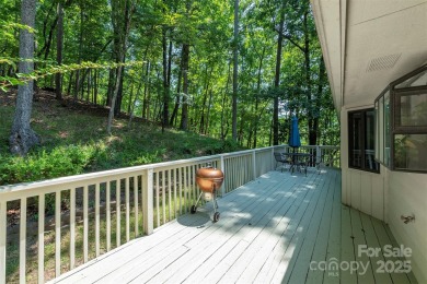 Tucked away in the sought-after Rumbling Bald community, this on Rumbling Bald Resort on Lake Lure in North Carolina - for sale on GolfHomes.com, golf home, golf lot