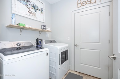 WELCOME HOME to this stunning fully furnished home away from on Gulf Hills Golf Club in Mississippi - for sale on GolfHomes.com, golf home, golf lot