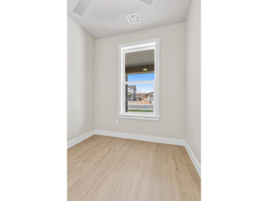4 Car Garage, 2x6 exterior walls, fireplace with built-ins on Copper Rock Golf Course in Utah - for sale on GolfHomes.com, golf home, golf lot
