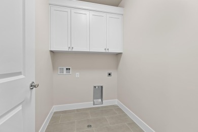 4 Car Garage, 2x6 exterior walls, fireplace with built-ins on Copper Rock Golf Course in Utah - for sale on GolfHomes.com, golf home, golf lot