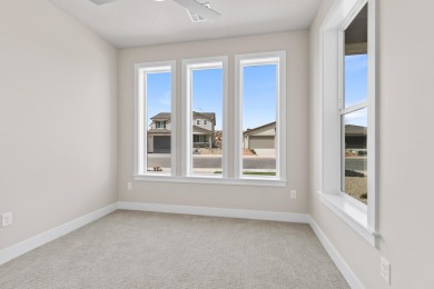 4 Car Garage, 2x6 exterior walls, fireplace with built-ins on Copper Rock Golf Course in Utah - for sale on GolfHomes.com, golf home, golf lot