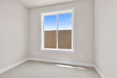4 Car Garage, 2x6 exterior walls, fireplace with built-ins on Copper Rock Golf Course in Utah - for sale on GolfHomes.com, golf home, golf lot