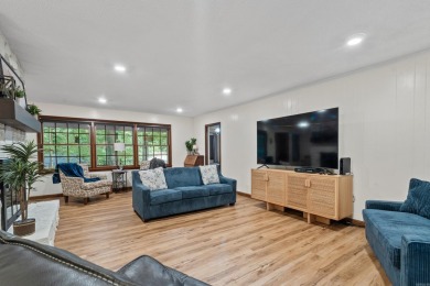 Nestled on a quiet street and surrounded by mature trees, this on DeSoto Golf Course in Arkansas - for sale on GolfHomes.com, golf home, golf lot