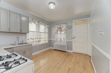 Beautifully updated Two-Unit brick building with full on Marquette Park Golf Course in Illinois - for sale on GolfHomes.com, golf home, golf lot