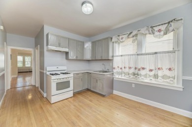 Beautifully updated Two-Unit brick building with full on Marquette Park Golf Course in Illinois - for sale on GolfHomes.com, golf home, golf lot