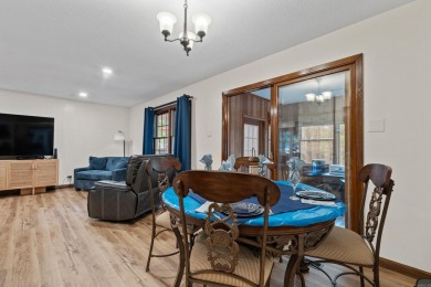 Nestled on a quiet street and surrounded by mature trees, this on DeSoto Golf Course in Arkansas - for sale on GolfHomes.com, golf home, golf lot