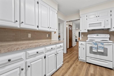 Nestled on a quiet street and surrounded by mature trees, this on DeSoto Golf Course in Arkansas - for sale on GolfHomes.com, golf home, golf lot