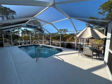 Welcome to this immaculate move in ready home on a double lot on Rotonda Golf and Country Club The Palms Course in Florida - for sale on GolfHomes.com, golf home, golf lot