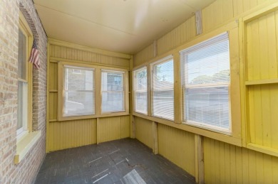 Beautifully updated Two-Unit brick building with full on Marquette Park Golf Course in Illinois - for sale on GolfHomes.com, golf home, golf lot
