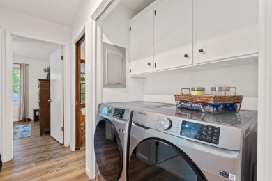 Nestled on a quiet street and surrounded by mature trees, this on DeSoto Golf Course in Arkansas - for sale on GolfHomes.com, golf home, golf lot
