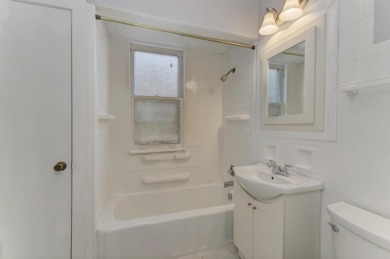 Beautifully updated Two-Unit brick building with full on Marquette Park Golf Course in Illinois - for sale on GolfHomes.com, golf home, golf lot