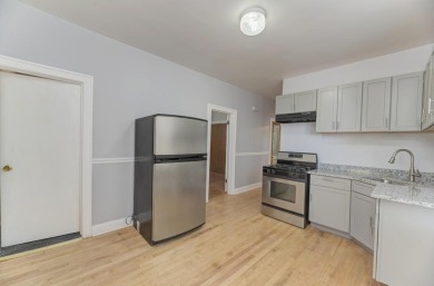 Beautifully updated Two-Unit brick building with full on Marquette Park Golf Course in Illinois - for sale on GolfHomes.com, golf home, golf lot