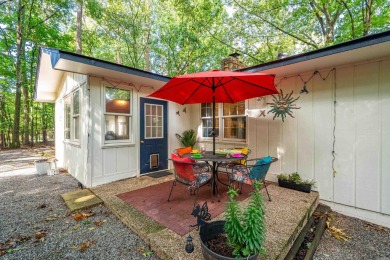 Nestled on a quiet street and surrounded by mature trees, this on DeSoto Golf Course in Arkansas - for sale on GolfHomes.com, golf home, golf lot