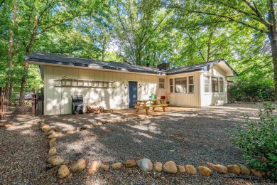 Nestled on a quiet street and surrounded by mature trees, this on DeSoto Golf Course in Arkansas - for sale on GolfHomes.com, golf home, golf lot