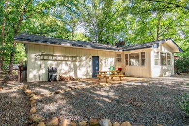 Nestled on a quiet street and surrounded by mature trees, this on DeSoto Golf Course in Arkansas - for sale on GolfHomes.com, golf home, golf lot