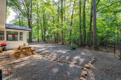 Nestled on a quiet street and surrounded by mature trees, this on DeSoto Golf Course in Arkansas - for sale on GolfHomes.com, golf home, golf lot