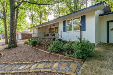 Nestled on a quiet street and surrounded by mature trees, this on DeSoto Golf Course in Arkansas - for sale on GolfHomes.com, golf home, golf lot
