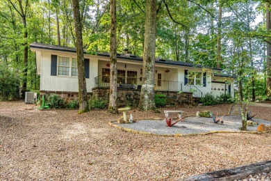 Nestled on a quiet street and surrounded by mature trees, this on DeSoto Golf Course in Arkansas - for sale on GolfHomes.com, golf home, golf lot