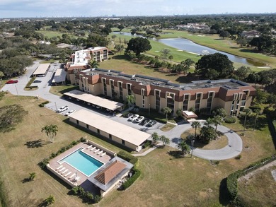 Elegant 3-bedroom, 2-bath residence located on the second floor on  in Florida - for sale on GolfHomes.com, golf home, golf lot