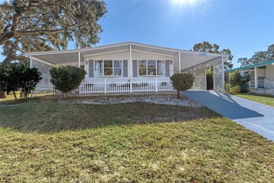 This delightful 2 bedroom 2 bath partially furnished home is in on High Point Golf Club, Inc. in Florida - for sale on GolfHomes.com, golf home, golf lot