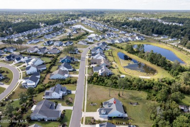 Welcome to the Gramercy floor plan by Bill Clark where coastal on Olde Point Golf and Country Club in North Carolina - for sale on GolfHomes.com, golf home, golf lot