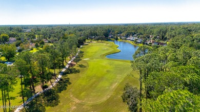 Beautiful home in the highly desirable Eagle Harbor community on Eagle Harbor Golf Club in Florida - for sale on GolfHomes.com, golf home, golf lot