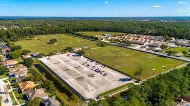 Beautiful home in the highly desirable Eagle Harbor community on Eagle Harbor Golf Club in Florida - for sale on GolfHomes.com, golf home, golf lot