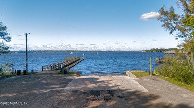 Beautiful home in the highly desirable Eagle Harbor community on Eagle Harbor Golf Club in Florida - for sale on GolfHomes.com, golf home, golf lot