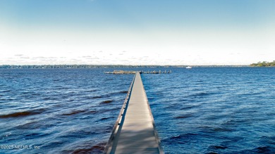 Beautiful home in the highly desirable Eagle Harbor community on Eagle Harbor Golf Club in Florida - for sale on GolfHomes.com, golf home, golf lot