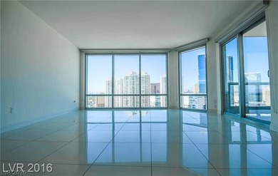 BEST PRICED HIGH FLOOR RESIDENCE w/ PHENOMENAL VIEWS OF THE on Las Vegas Country Club in Nevada - for sale on GolfHomes.com, golf home, golf lot