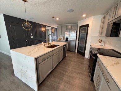Welcome to this exceptional Zephyr Ridge residence, built in on The Links of Lake Bernadette in Florida - for sale on GolfHomes.com, golf home, golf lot