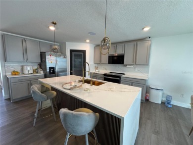 Welcome to this exceptional Zephyr Ridge residence, built in on The Links of Lake Bernadette in Florida - for sale on GolfHomes.com, golf home, golf lot