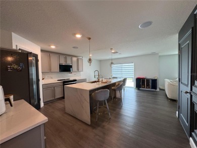 Welcome to this exceptional Zephyr Ridge residence, built in on The Links of Lake Bernadette in Florida - for sale on GolfHomes.com, golf home, golf lot