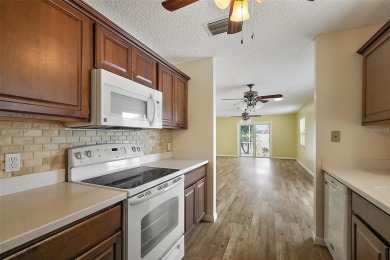 RARE FIND! 1/1 BLOCK AND STUCCO Courtyard Villa with a OVERSIZED on El Diablo Executive Golf Course in Florida - for sale on GolfHomes.com, golf home, golf lot
