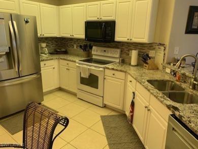 This is a FULLY FURNISHED TURNKEY END UNIT - Condo and is on Colonial Country Club in Florida - for sale on GolfHomes.com, golf home, golf lot