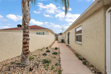 RARE FIND! 1/1 BLOCK AND STUCCO Courtyard Villa with a OVERSIZED on El Diablo Executive Golf Course in Florida - for sale on GolfHomes.com, golf home, golf lot