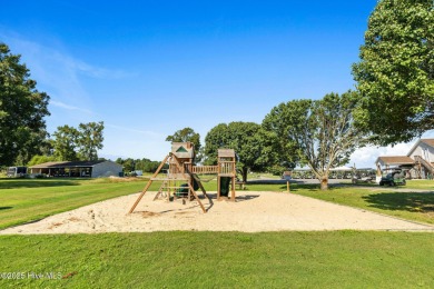 This 6-bedroom, 3-bath home delivers the kind of lifestyle most on Eagle Creek Golf Club and Grill in North Carolina - for sale on GolfHomes.com, golf home, golf lot