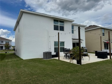 Welcome to this exceptional Zephyr Ridge residence, built in on The Links of Lake Bernadette in Florida - for sale on GolfHomes.com, golf home, golf lot