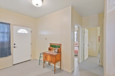 Situated on sought-after Loop Road, this inviting home rests on on Alpine Golf Course in Texas - for sale on GolfHomes.com, golf home, golf lot