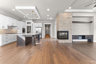 Welcome to the FOXTROT by Brighton Homes! Entertainer's dream! on Boise Ranch Golf Course, Inc. in Idaho - for sale on GolfHomes.com, golf home, golf lot