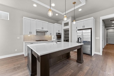 Welcome to the FOXTROT by Brighton Homes! Entertainer's dream! on Boise Ranch Golf Course, Inc. in Idaho - for sale on GolfHomes.com, golf home, golf lot