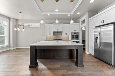 Welcome to the FOXTROT by Brighton Homes! Entertainer's dream! on Boise Ranch Golf Course, Inc. in Idaho - for sale on GolfHomes.com, golf home, golf lot