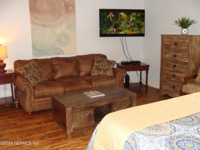 Updated furnished condo w/ breathtaking pool views in on King and Bear Golf Course/World Golf Village in Florida - for sale on GolfHomes.com, golf home, golf lot