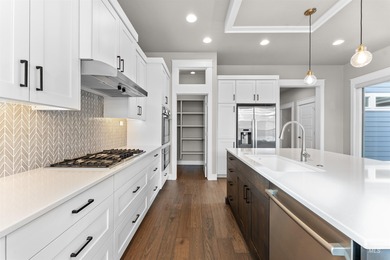 Welcome to the FOXTROT by Brighton Homes! Entertainer's dream! on Boise Ranch Golf Course, Inc. in Idaho - for sale on GolfHomes.com, golf home, golf lot