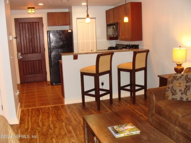Updated furnished condo w/ breathtaking pool views in on King and Bear Golf Course/World Golf Village in Florida - for sale on GolfHomes.com, golf home, golf lot
