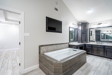 Stunning 4 bed, 3 bath home on the golf course with sweeping on Green Tree Country Club in Texas - for sale on GolfHomes.com, golf home, golf lot