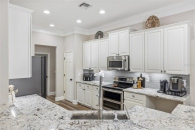Stunning Pool Home with $200K in Thoughtful Upgrades in Gated on Stoneybrook Golf Club At Heritage Harbour in Florida - for sale on GolfHomes.com, golf home, golf lot