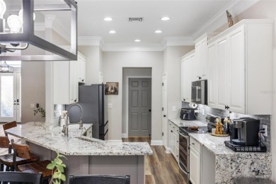 Stunning Pool Home with $200K in Thoughtful Upgrades in Gated on Stoneybrook Golf Club At Heritage Harbour in Florida - for sale on GolfHomes.com, golf home, golf lot