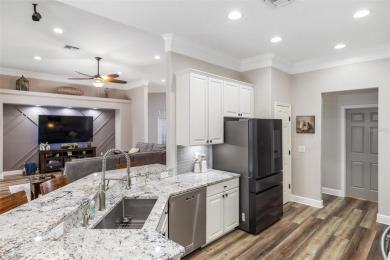 Stunning Pool Home with $200K in Thoughtful Upgrades in Gated on Stoneybrook Golf Club At Heritage Harbour in Florida - for sale on GolfHomes.com, golf home, golf lot